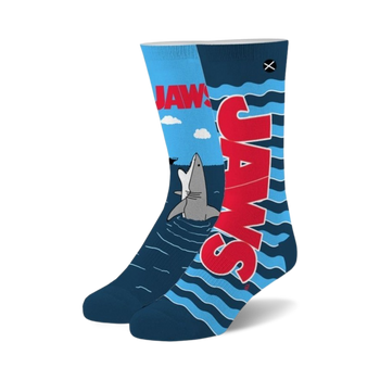 blue crew socks with gray shark and red fin jumping from water with clouds, for men and women.   