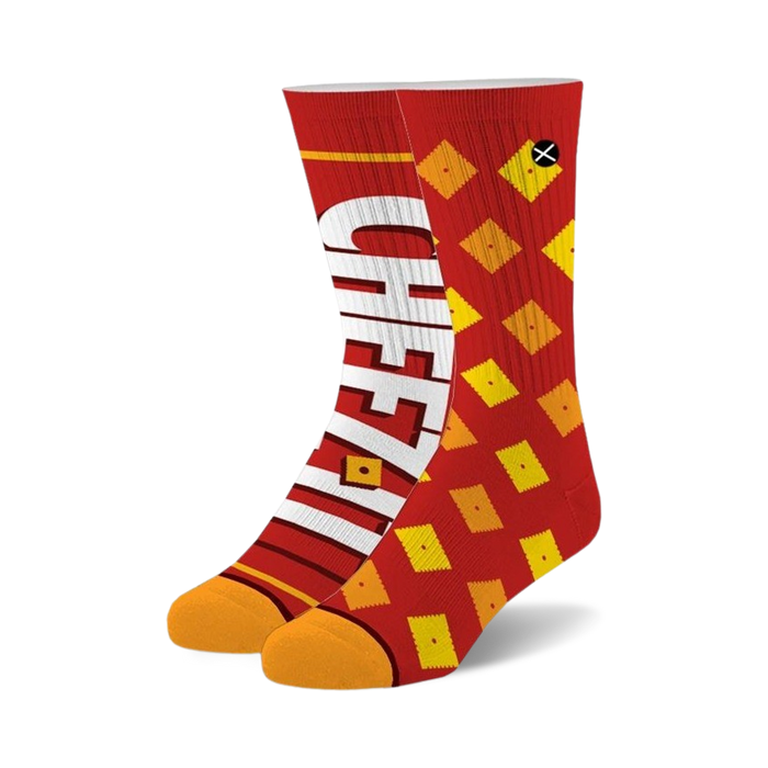 red crew socks with white and yellow cartoon cheez it cracker pattern fun and delicious cheez it socks for men and women  / 