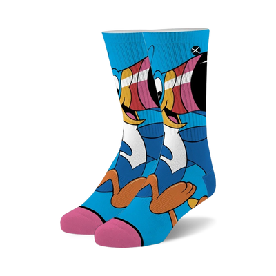 blue crew socks with colorful cartoon toucan sam froot loops pattern. fun socks for men and women.   