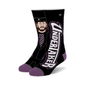 Pair of black crew socks with a purple and white Undertaker graphic.  Features a cartoon-style image of The Undertaker in his signature attire.