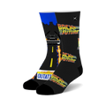 Pair of black crew socks with Back to the Future design. Features DeLorean, flames, and OUTATIME license plate. 