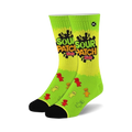 Pair of lime green crew socks with Sour Patch Kids logo and gummy candy illustrations. Black cuffs.
