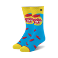 Pair of crew socks in blue with yellow cuffs.  The socks feature a repeated pattern of red Swedish Fish candies and the Swedish Fish logo.