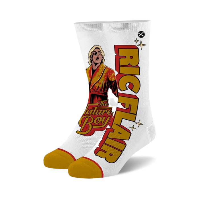 novelty socks featuring professional wrestler ric flair in a yellow robe with stars in a white background with red and yellow stars. with 