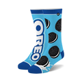Pair of blue crew socks with Oreo cookies and logo design. Features white and black Oreo cookies on a light blue background.