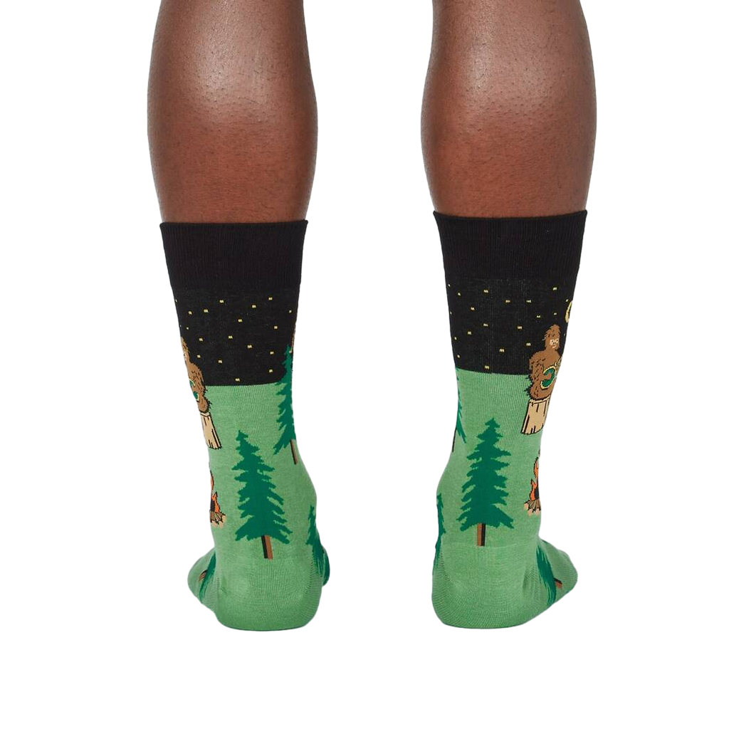 Back view of the socks on a model's legs to show the design details at the back of the socks.
