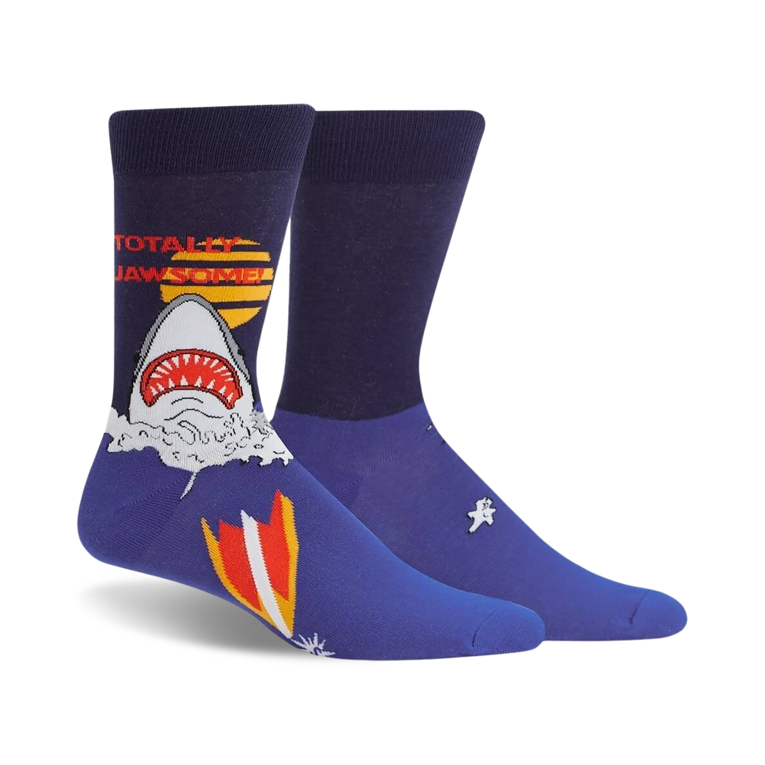 Pair of navy blue crew socks featuring a graphic of a shark emerging from water with a retro surfboard design and 'Totally Jawsome!' text.