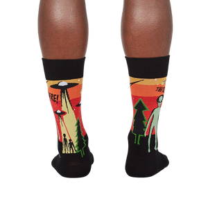 Rear view of the 'They're Here' socks, showing the design on the back of the socks.
