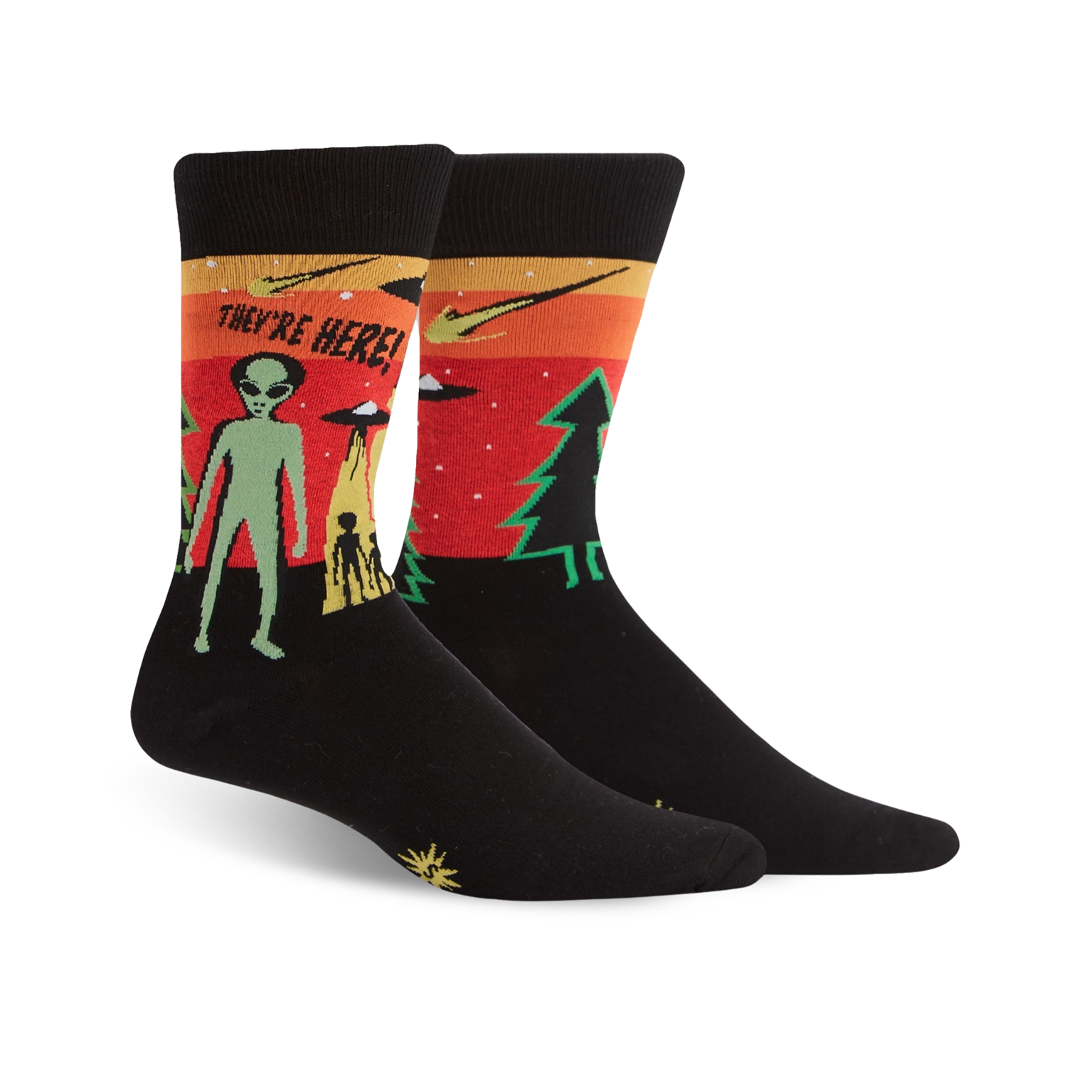 Black crew socks with a retro alien abduction scene in orange, green, and red. The text 'They're Here!' is featured.