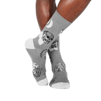 Lifestyle shot of Head Over Heel socks on a person's legs, showcasing the fit and design.