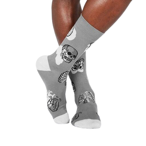 Lifestyle shot of Head Over Heel socks on a person's legs, showcasing the fit and design.