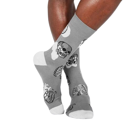 Lifestyle shot of Head Over Heel socks on a person's legs, showcasing the fit and design.