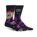 A pair of crew socks with a space-themed design.  The dark background features swirling nebulas in purple, orange, and teal, along with yellow stars.