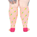 Back view of the 'GRL PWR' knee-high socks, highlighting the full lightning bolt pattern on a peachy pink background.