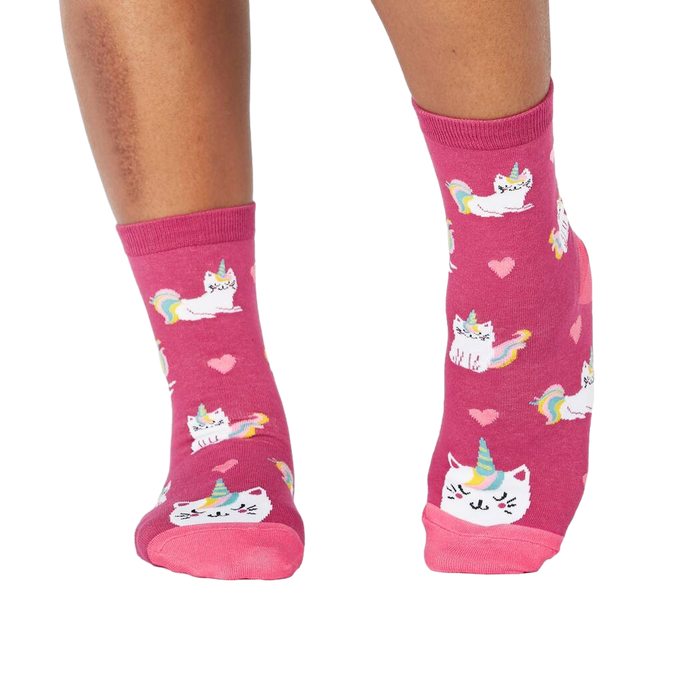 Lifestyle photo showing the 'Look At Me Meow' socks on a person's feet.