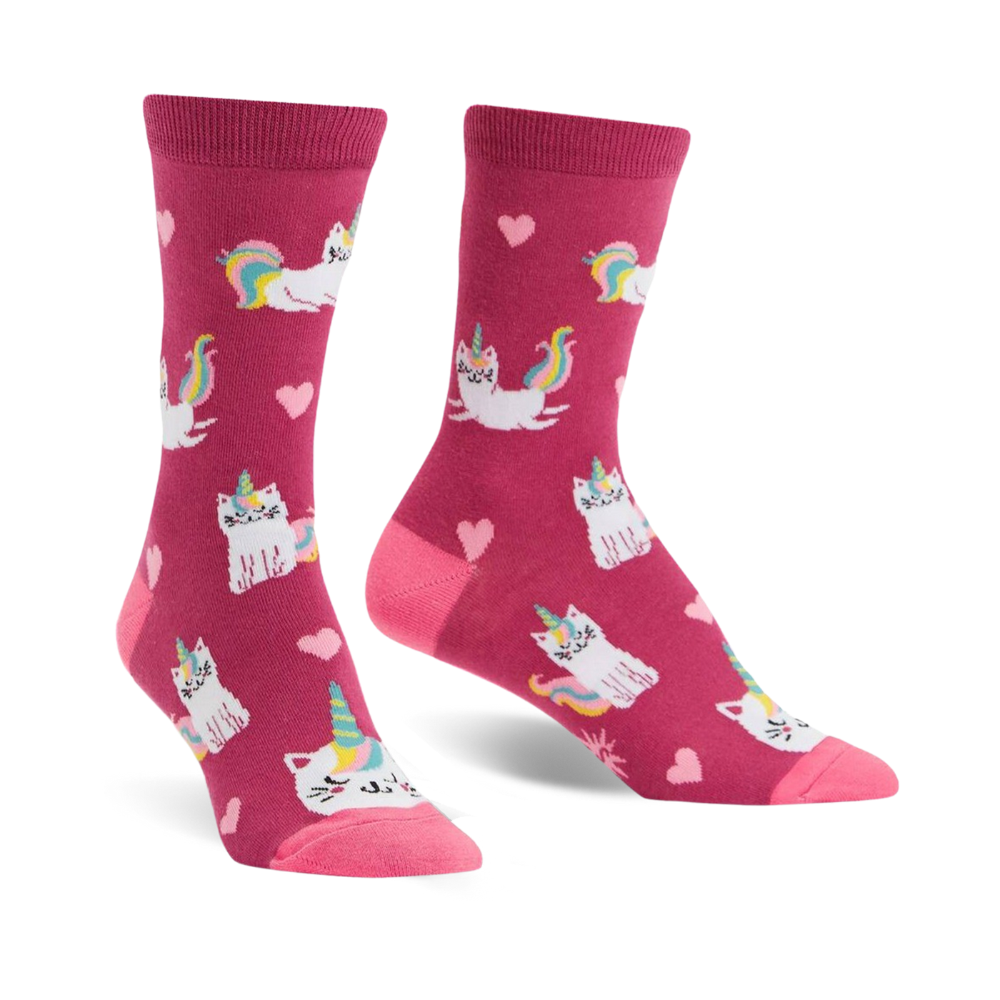 Crew socks in pink featuring a pattern of white cats with unicorn horns and rainbow tails, and pink hearts.