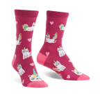 Crew socks in pink featuring a pattern of white cats with unicorn horns and rainbow tails, and pink hearts.