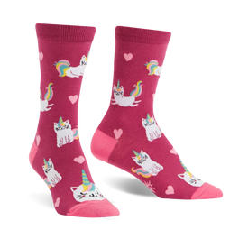 pink crew socks for women with a pattern of white cats wearing unicorn horns and hearts with rainbows.  