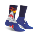 A pair of blue crew socks with a graphic design of a great white shark emerging from the water, text says 'Totally Jawsome'.