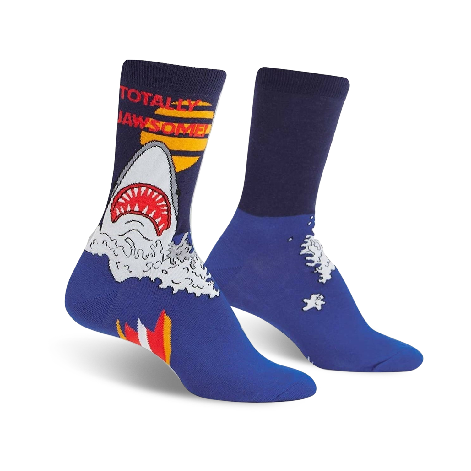 A pair of blue crew socks with a graphic design of a great white shark emerging from the water, text says 'Totally Jawsome'.