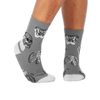 Lifestyle shot of Head Over Heel socks on a person's legs, showcasing the anatomical design and fit.