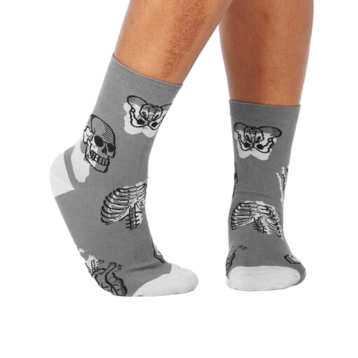 Lifestyle shot of Head Over Heel socks on a person's legs, showcasing the anatomical design and fit.