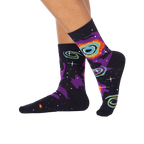 Lifestyle shot showing Helix Nebula socks on a person's legs.