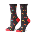 Crew socks in black glitter with multicolored rainbow pattern and coral heel and toe.