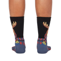 Back view of the 'All Bundled Up' socks on a model.  Shows the full moose design and snowflake pattern on the back of the socks.