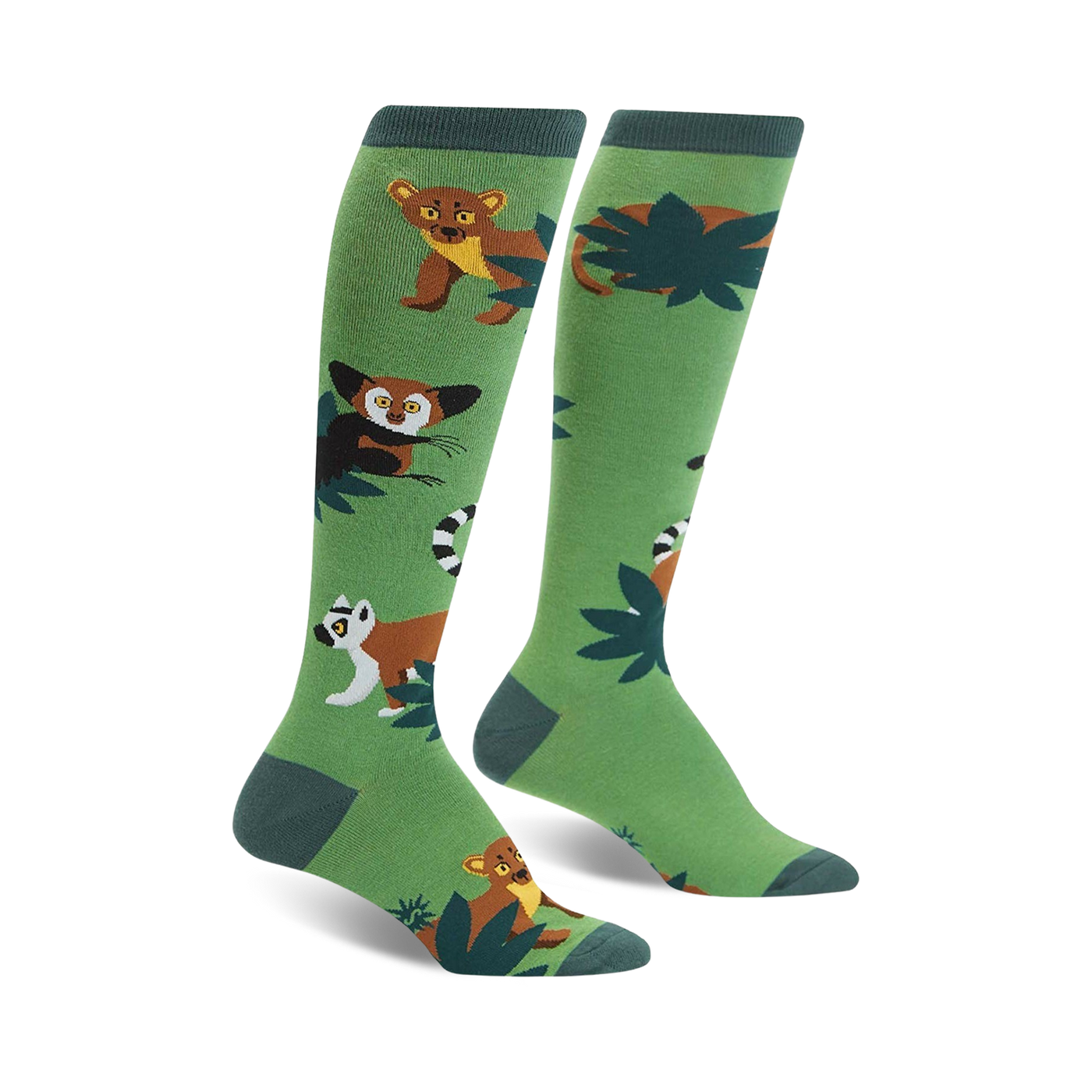 A pair of green knee-high socks with illustrated lemurs, fossa, and tropical leaves. Brown, white, and dark-green details on a bright green background.