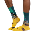Lifestyle shot of a person wearing the Skeleton Crew socks, showing how they look when worn.
