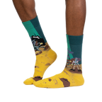Lifestyle shot of a person wearing the Skeleton Crew socks, showing how they look when worn.