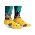 Pair of crew socks in teal, mustard yellow, and brown. Design features a skeleton pirate at the helm of a ship with treasure.