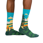 Lifestyle shot of model wearing Grand Prismatic socks, showcasing the design and fit.