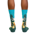 Rear view of model wearing Grand Prismatic socks, highlighting the full sock design.