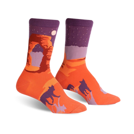 orange and purple crew socks with a desert scene, featuring a large arch and two wolves.  