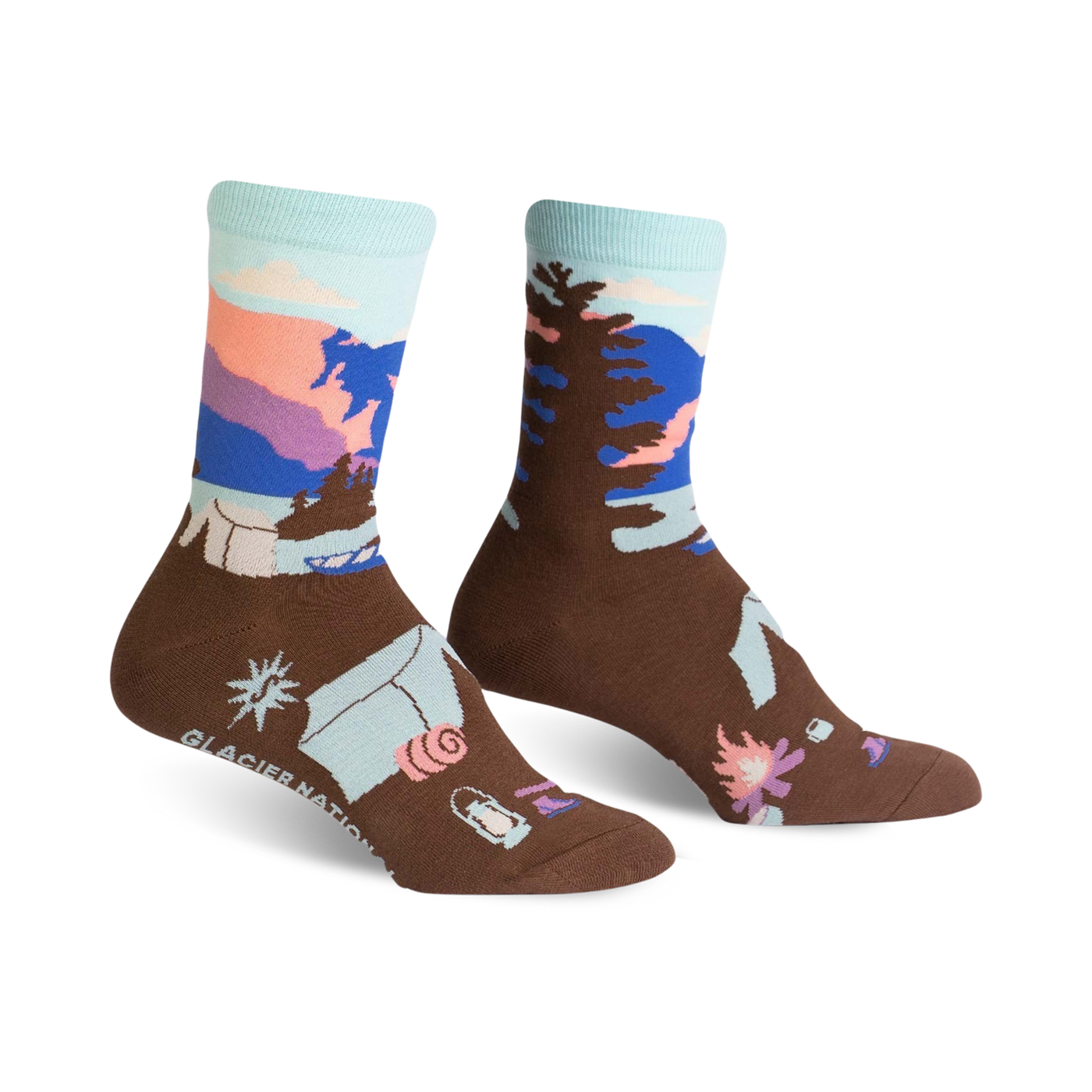 Brown crew socks with a Glacier National Park design.  Features a mountain scene, trees, and camping gear in blues, pinks, and purples.
