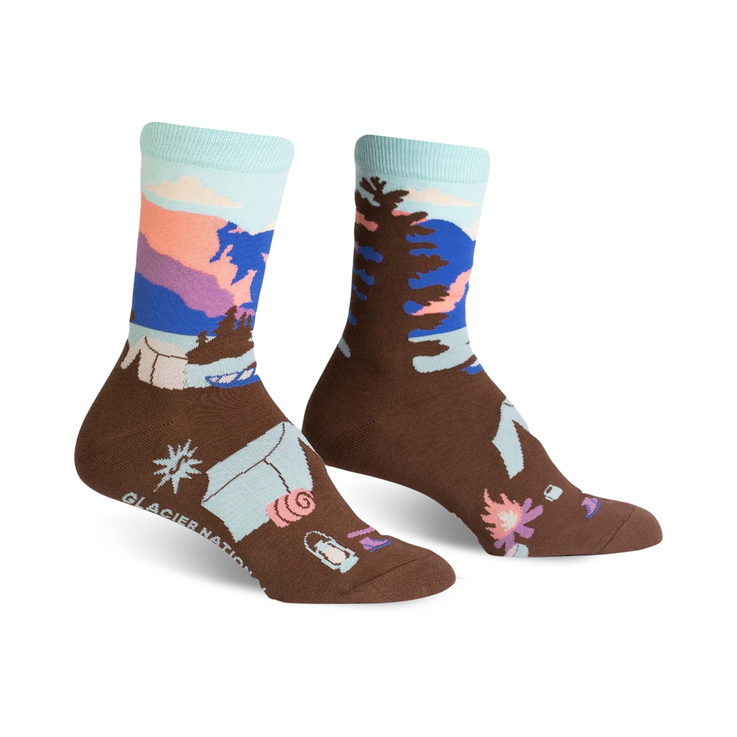 Brown crew socks with a Glacier National Park design.  Features a mountain scene, trees, and camping gear in blues, pinks, and purples.