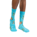 Lifestyle shot of a person wearing the turquoise 'Unknown Floating Object' socks.