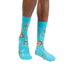 Lifestyle shot of a person wearing the turquoise 'Unknown Floating Object' socks.