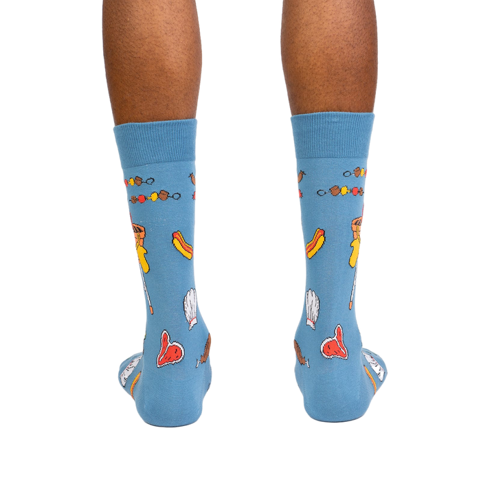 Back view of the 'Grillin' It' socks on a person's legs, showcasing the full design on the back of the socks.