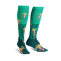 A pair of teal knee-high socks adorned with whimsical jellyfish and seaweed designs.  Perfect for adding a touch of ocean magic to your outfit!