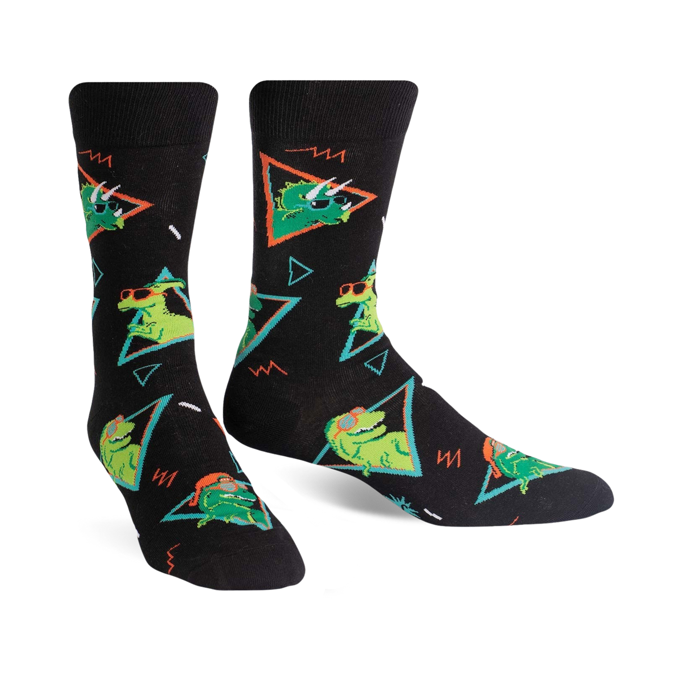 Pair of black crew socks with green dinosaurs wearing sunglasses, set against a 90s-style geometric pattern. 