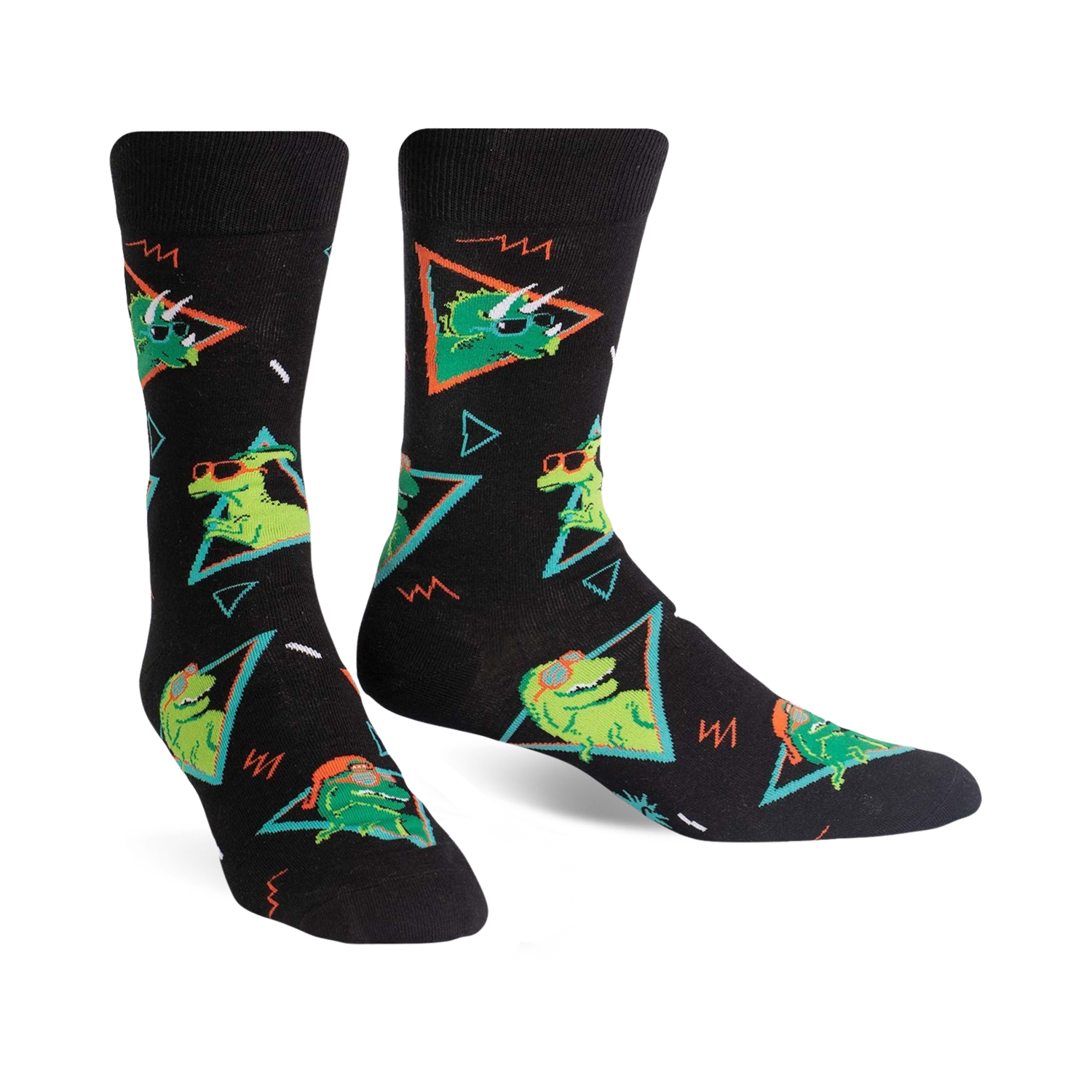 Pair of black crew socks with green dinosaurs wearing sunglasses, set against a 90s-style geometric pattern. 