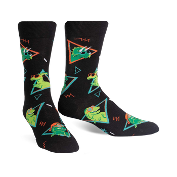 black crew socks feature geometric pattern with green dinosaurs wearing sunglasses and pink hats.  