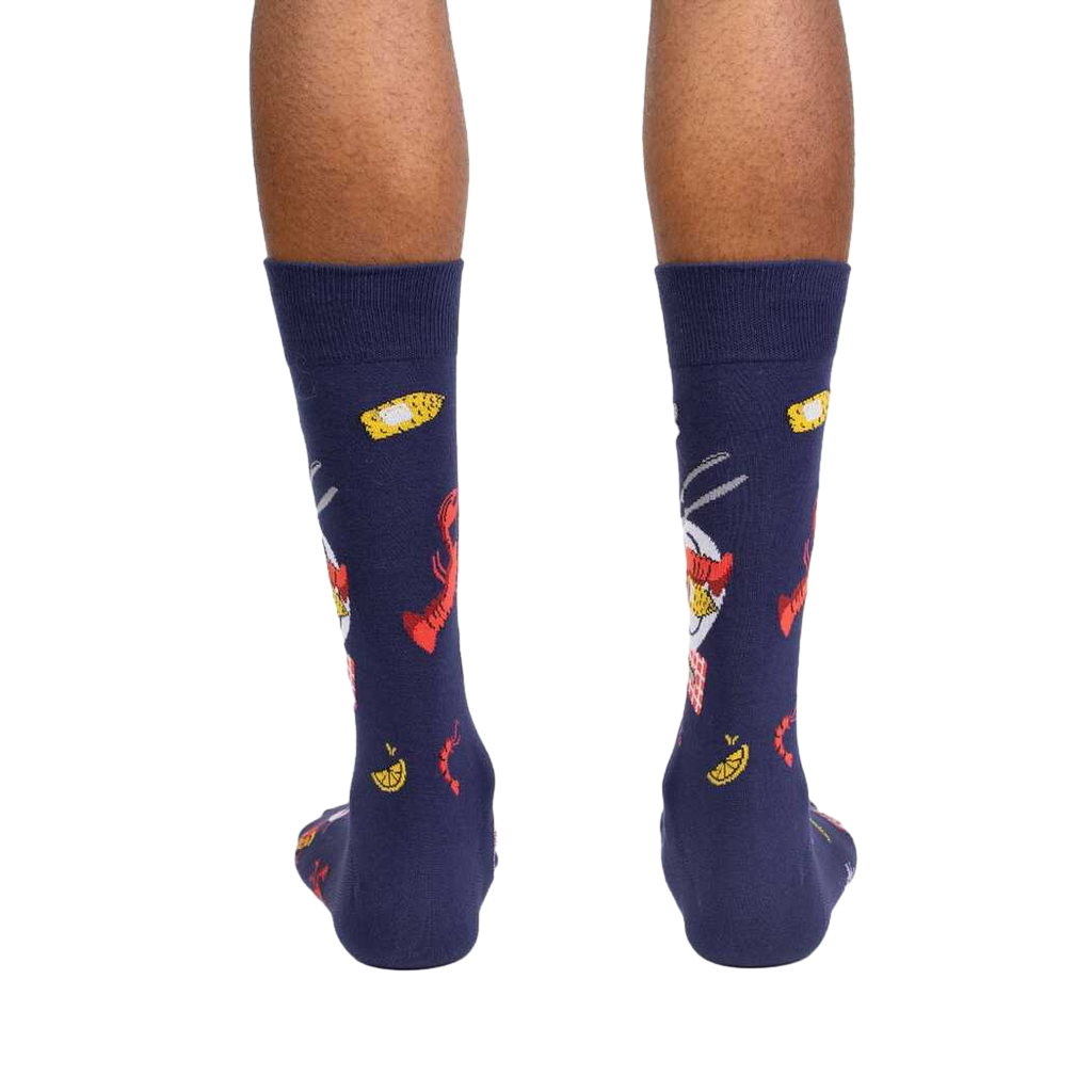 Detailed flat lay product shot of the 'Get Crackin!' socks, showing the complete design and color scheme.