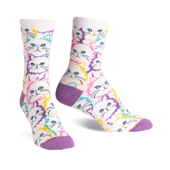  white crew socks with colorful cartoon cat face pattern. perfect for cat lovers.  