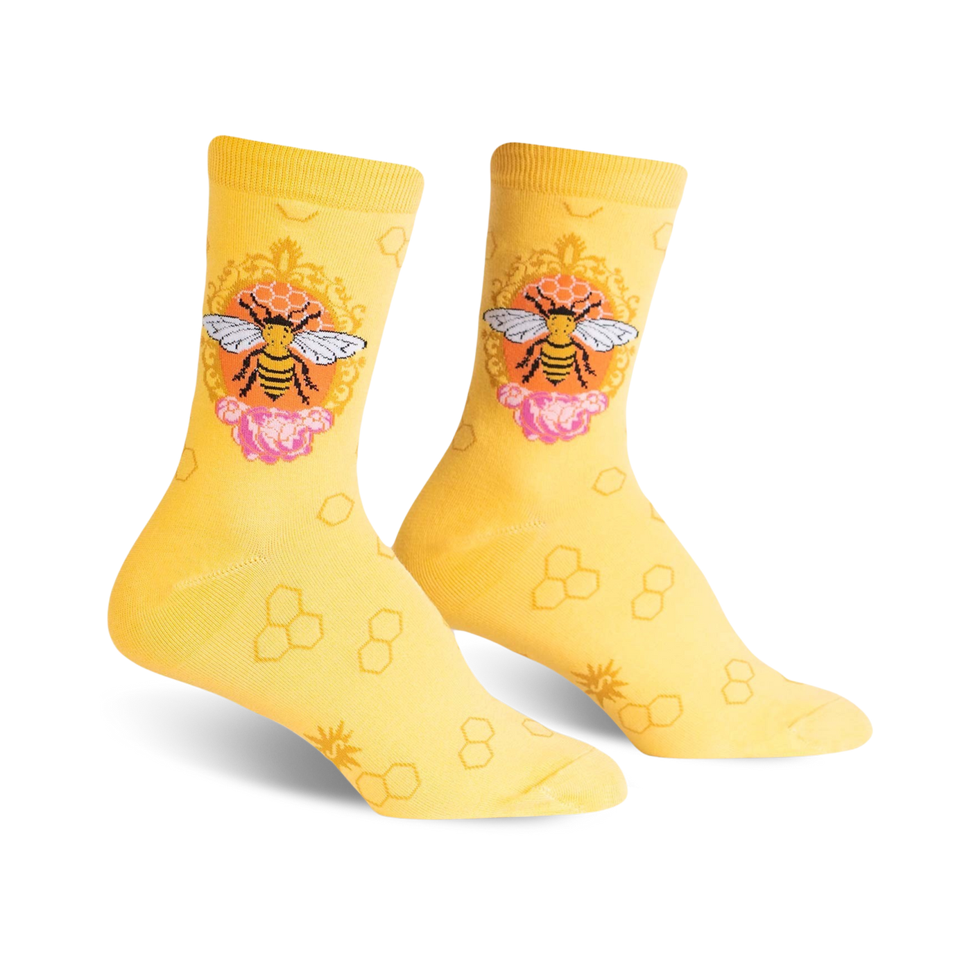 A pair of women's crew socks in yellow with a repeating honeycomb pattern.  A central design shows a bee in an ornate frame with pink flowers.