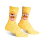 A pair of women's crew socks in yellow with a repeating honeycomb pattern.  A central design shows a bee in an ornate frame with pink flowers.