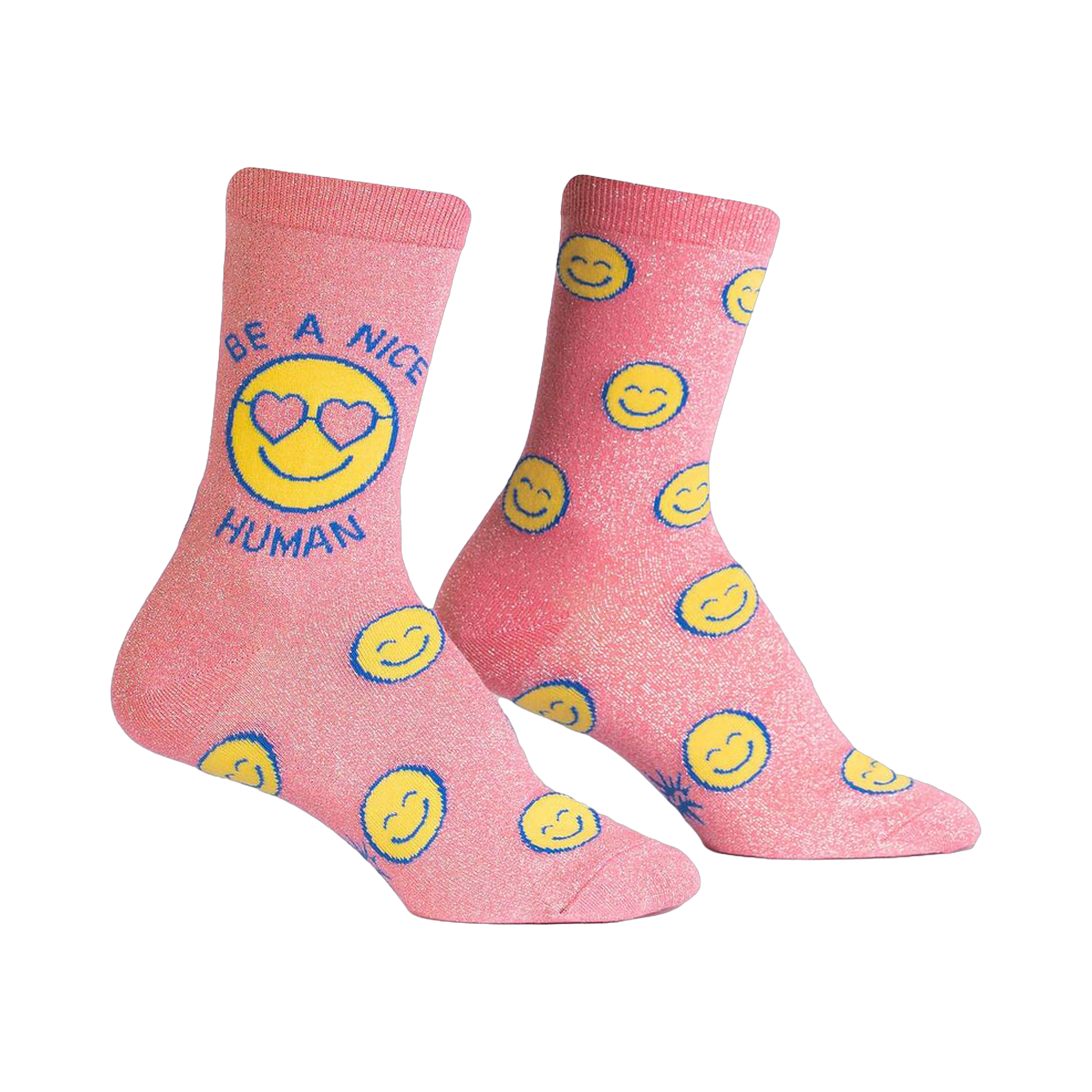 Crew socks in pink with glitter.  The design features yellow smiley faces and the phrase 'Be a Nice Human' on one sock.